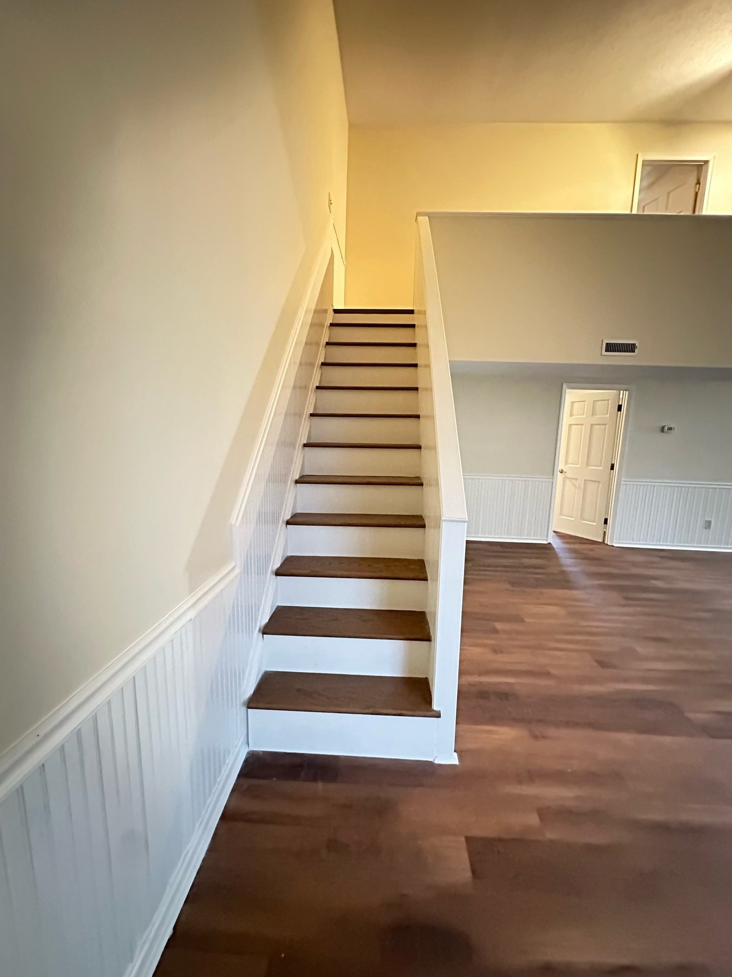 Finished stair with beadboard and wood treads